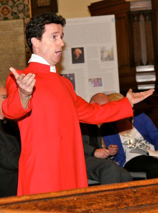 Tenor Morgan Crowley of St Ann’s Choir entertains the crowd at the launch of the new permanent exhibition in the church. 