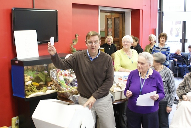 Brian Dobson of RTE pulls the winning raffle ticket at the Royal Hospital Donnybrook's Christmas Sale. Photo: Eamonn Quigley