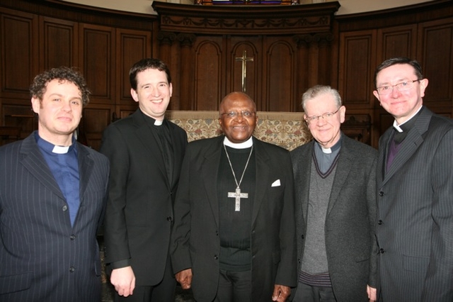 Archbishop Desmond Tutu (centre) with the Chaplains of Trinity College Dublin, (left to right) the Revd Julian Hamilton (Methodist/Presbyterian), the Revd Darren McCallig (Church of Ireland), Fr Paddy Gleeson and Fr Kieron  Dunne (Roman Catholic).
