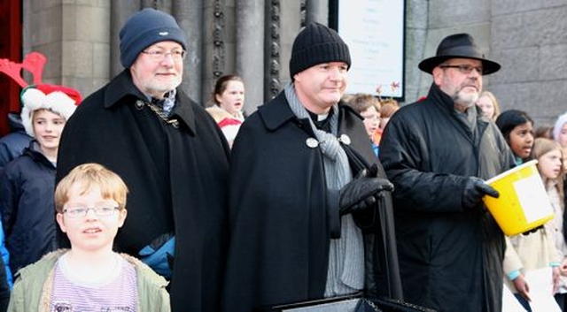 St Ann’s Curate, the Revd Martin O’Connor; Vicar, the Revd David Gillespie; and Verger, Fred Deane at the launch of the 2012 Black Santa Sit Out at the Dawson Street church. The sit out raises funds for St Vincent de Paul, the Salvation Army, the Simon Community, Protestant Aid, Trust and the Church of Ireland Overseas Aid. Clergy of the parish and colleagues will continue to collect outside the church until Christmas Eve.