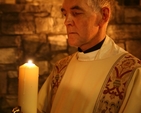 The Archdeacon of Dublin, the Venerable David Pierpoint with the Paschal Candle lit during Easter Vigil in Christ Church Cathedral.