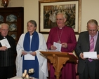 At the carol service at St John's House are (left to right) Fr Sean Hynes, Roman Catholic Chaplain at the House, Joan Kirk, Lay Church of Ireland Chaplain, the Archbishop of Dublin, the Most Revd Dr John Neill and Ivor Moloney, Chairman of St John's House.