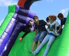 Young people enjoying the bouncy castle at the East Glendalough Parishes Funday. Photo: The Revd Nigel Waugh.