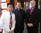 Archbishop Michael Jackson and Revd Dr Alan McCormack are pictured with Alphege Geoffrey of the Hong Kong youth groups. Alphege’s tie playfully recalls the colonial history of the territory. 