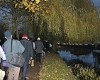The Advent Walk of Light, an inter-church journey organised by the Dublin Council of Churches, passes by the river in Rathmines.