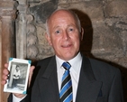 Pictured is Robert Olliffe who was a chorister of Christ Church Cathedral from 1957-1961 with a photograph of himself during those years. He is pictured at a reception for former choristers of Christ Church.