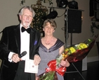 Des Campbell presents a bouquet to Carol Revington at the recent ‘Bid to Save Christ Church’ Ball in Castle Durrow, Durrow,
Co Laois.