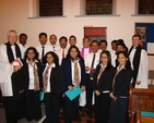 Canons Horace McKinley and Mark Gardner with the Malayalam Church Choir at St Catherine’s Church, Donore Avenue.