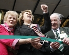 President Mary McAleese cuts the ribbon as she officially opens the 2010 National Ploughing Championships in Athy, Co Kildare.