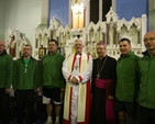 The Archbishops of Dublin, the Most Revd Dr John Neill (centre left) and the Most Revd Diarmuid Martin (centre right) with members of the St Patrick's Rowing club who brought an Icon of St Patrick up the river Liffey to the Dublin Council of Church's Ecumenical St Patrick's Eve service in City Quay RC Church.
