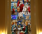 Stained glass in St Ann's Church, Dawson Street, Dublin featuring St Mark (above) and St Ann (below) and the coat of arms of Dublin city. The church was recently re-opened following refurbishment.