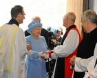 Queen Elizabeth II is meets the Archbishop of Armagh and Primate of All Ireland, the Most Revd Alan Harper, OBE and the Archbishop of Dublin, the Most Revd Dr Michael Jackson, at the entrance to St Macartin’s Cathedral, Enniskillen. (Photo: Harrison Photography)