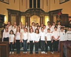 Pupils from Kildare Place School with their principal and organist at Songs of Praise in St Ann’s Church, Dawson Street, Dublin
