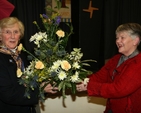 Betty Neill, wife of the Archbishop of Dublin the Most Revd Dr John Neill is presented with flowers following the reception to mark the centenary of the foundation of Stillorgan and Blackrock Mothers' Union.