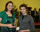 Síofra Bennett and Evan O'Brien, joint winners of the Wilson and Suffern Form Prize for First place in the Leaving Certificate with their medals at Kings Hospital Charter Day.