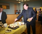 The Revd Scott Peoples, Rector of Lucan and Leixlip cutting the cake at the reception to mark the 25th Anniversary of his ordination. 