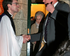 Revd Niall Sloane greets a member of the congregation following his Service of Institution at Holy Trinity Church, Killiney.