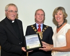 Receiving their award at County Hall, Tallaght, were Canon Horace McKinley, Rector of Whitechurch Parish; Councillor Eamonn Maloney; and Pamela Sheil, Whitechurch Parish Eco-Congregation Representative. Photo: Tommy Keogh