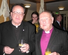 Pictured at the launch of From the Margins to the Centre – A History of the Irish Times in Trinity College Dublin are Fr Anthony Gaughan, (RC) Parish Priest of Newtown Park Blackrock and the former Archbishop of Dublin, the Rt Revd Donald Caird.