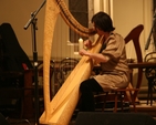 The Revd Anne-Marie O'Farrell playing the harp at An Evening of Music and Song, a concert in Sandford Parish Church.