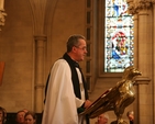The Dean of Christ Church, the Very Revd Dermot Dunne reading the Gospel at Evensong in the Cathedral marking the foundation of the Christ Church Cathedral Past Choristers Association.