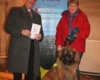 Canon Ted Ardis with Deirdre Murphy and Dexter at the Christ Church Cathedral Charity Carol Service in aid of Peata – Providing a Pet Therapy Service to caring institutions in Dublin.