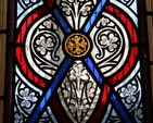 A close up photo of the stained glass window in St Laurence's Church, Chapelizod, one of two re-dedicated by the Archbishop of Dublin, the Most Revd Dr John Neill following their extensive refurbishment.