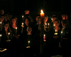 Members of the Unity Gospel Choir performed by candlelight at the Easter Vigil at Killiskey Parish Church, Nun’s Cross, County Wicklow. 