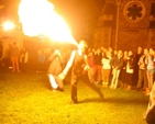 A fire eater performs outside Christ Church Cathedral Dublin before Essential Christmas with a Twist organised by 3Rock Youth.
