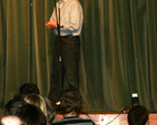 Event coordinator, Brian Hunt, introduces the acts at Zion’s Got Talent in the High School. 