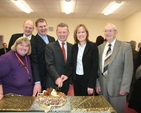 The Minister of State for Food and Horticulture, Trevor Sargent TD cuts the cake to mark the opening of a new school building. Pictured with him (left to right) are Pauline O'Shea, Acting Principal, Robert Cashell, Chairman of the Board of Management, the Revd Alan Rufli, Rector, Elayne Browne, Principal and Leslie Cashell, former pupil.