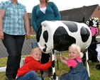 Andrew, Melanie and mum, Iris Hawkins with Donna Moody and Daisy the cow at Donoughmore Parish Fete. 