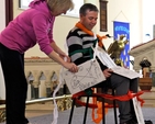 The Revd Isaac Delamere (Timolin) is bound by chains of poverty to illustrate the Revd Olive Donohoe’s (Athy) sermon at the West Glendalough Children’s Choral Festival in St Michael’s Church, Athy. 