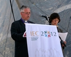 Revd Ken Rue and Gillian Kingston, the Lay Leader of the Methodist Church, address the crowd in the main arena of the RDS prior to the Liturgy of Word and Water on the first full day of the International Eucharistic Congress. 