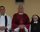 The Archbishop of Dublin, the Most Revd Dr John Neill celebrates communion in St Mary's Home. Also pictured is the Revd Andrew McCroskerry (left) and Sr Verity-Anne, a member of the Anglican Order of Nuns, the Order of St John the Evangelist.