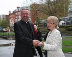 Minister Mary Hanafin shares a joke with Dean Dermot Dunne at the Rediscover Christ Church Book Launch.