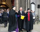 Archbishop Diarmuid Martin, Archbishop Michael Jackson and Vicar of St Ann’s Revd David Gillespie shake a bucket for the Black Santa Appeal which took place from Friday December 16 until Christmas Eve outside St Ann’s Church on Dawson Street. 