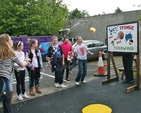 Children enjoying splashing the rector, the Revd Ian Gallagher, at the May Fair at St Brigid’s Church, Stillorgan!