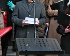 Deputy Robert Dowds TD reads at the community carol singing at Dublin’s Mansion House.