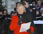 Éanna Ní Lamhna pictured reading at the Ecumenical Carol Singing in front of the Mansion House, Dawson Street, Dublin. 