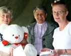 Heather Moody, Revd Olive Henderson and Ruth Fisher prepare for the auction at Donoughmore Parish Fete. 