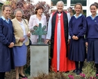 Rathdown School students, Kirsten Stravides, Rebecca Andrews and Clodagh Towns, join past principal Miss Stella Mews, current prinicipal Anne Dowling and Archbishop Michael Jackson following the unveiling of a sculpture to mark the school’s 40th anniversary. 
