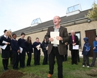 Tree planting at the ecumenical service at Mount Seskin Community College, Tallaght.