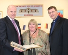 Pictured with the first Minutes book of St Georges NS Balbriggan are (left to right) Robert Cashell, Chairman of the Board of Management, Pauline O'Shea, Principal and the Revd Alan Rufli, Rector. St Georges NS recently celebrated 150 years in existence.