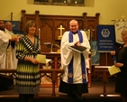 Pictured is the new Mothers' Union Diocesan President Joy Gordon (left) receiving applause at her commissioning in Whitechurch. Also pictured are her predecessor Ann Walsh (right), the Archbishop of Dublin, the Most Revd Dr John Neill and the Revd Obinna Ulogwara, Curate of Whitechurch (left background) and the Revd Paul Houston, Diocesan Chaplain to the Mothers' Union (centre).