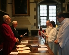 Pictured reading their declarations prior to their ordination to the Priesthood in Christ Church Cathedral are (right, background to foreground), the Revd Anne-Marie O'Farrell, the Revd Robert Lawson and the Revd Stephen Farrell. Also pictured are the Archbishop of Dublin, the Most Revd Dr John Neill and the Registrar, the Revd Canon Victor Stacey.
