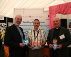 Pictured at the stand at the National Ploughing Championships being jointly run by the Church of Ireland Diocese of Dublin and Glendalough, the Roman Catholic Diocese of Dublin and the Irish Missionary Union are (left to right) the Revd Cliff Jeffers, Rector of Athy, Ronan Barry of the Irish Missionary Union and the Venerable Ricky Rountree, Archdeacon of Glendalough.