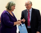 Jimmy Woolmington is presented with a gift for overseeing the construction of St Saviour’s parish hall. 