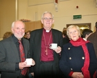 Archbishop John Neill and his wife Betty Neill are pictured with George Walsh, designer of the window, at the reception after the service to dedicate the St Francis stained glass window in Sandford Parish Church. The window is in memory of the Threlfall family. 