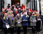 The choir, Teen–Spirit, with the readers and organisers braved gales and occasional rain for the annual ecumenical carol singing on the steps of the Mansion House on Saturday December 14. 